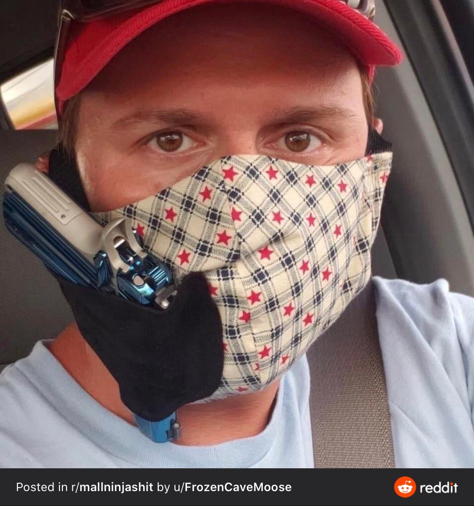 Mask with integrated gun holster